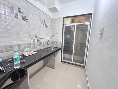 Kitchen Image of 715 Sq.ft 1 BHK Apartment / Flat for sale in Pushpak Nagar Navi Mumbai for Rs. 3200000
