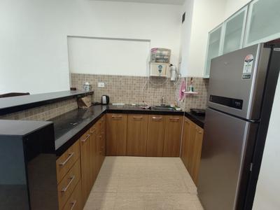 Kitchen Image of 640 Sq.ft 1 RK Studio for rent in Lodha Belmondo, Gahunje Pune for Rs. 43000