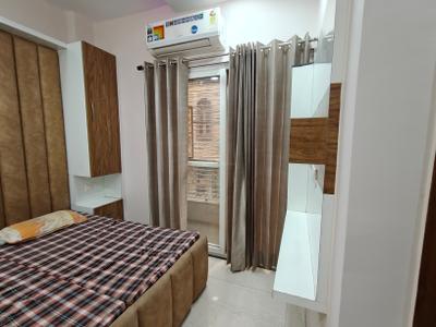 Bedroom Image of 372 Sq.ft 1 BHK Studio for rent in DLF Capital Greens Phase 1 And 2, Karampura New Delhi for Rs. 25000