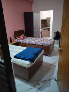 Bedroom Image of J.S LUXURY PG in Bajidpur, Noida