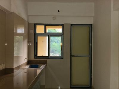 Kitchen Image of 616 Sq.ft 1 BHK Apartment / Flat for sale in Cosmos Meluha, Khidkali Thane for Rs. 4700000