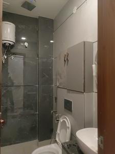 Common Bathroom Image of 1000 Sq.ft 3 BHK Builder Floor for sale in Pitampura New Delhi for Rs. 18000000