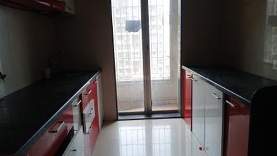 Kitchen Image of 1000 Sq.ft 2 BHK Apartment / Flat for rent in Neelsidhi Amarante, Kalamboli Navi Mumbai for Rs. 26000