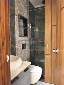 Common Bathroom Image of 2500 Sq.ft 4 BHK Builder Floor for sale in Ansal Versalia, Sector 67 Gurgaon for Rs. 28000000