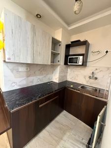 Kitchen Image of 550 Sq.ft 1 BHK Builder Floor for rent in Sector 57 Gurgaon for Rs. 38000