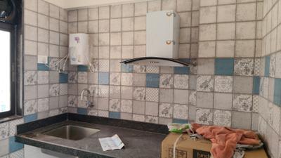 Kitchen Image of 980 Sq.ft 2 BHK Apartment / Flat for rent in Paradise Sai Icon, Kharghar Navi Mumbai for Rs. 35999
