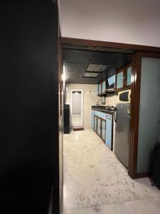 Kitchen Image of 700 Sq.ft 1 BHK Apartment / Flat for rent in God Gifts Building, Lower Parel Mumbai for Rs. 65000