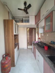 Kitchen Image of 800 Sq.ft 2 BHK Apartment / Flat for sale in Naigaon East Naigaon for Rs. 5499000