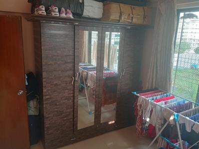 Bedroom Image of 775 Sq.ft 2 BHK Apartment / Flat for sale in Evershine Millennium Paradise, Kandivali East Mumbai for Rs. 14000000