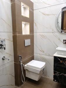 Common Bathroom Image of 550 Sq.ft 2 BHK Apartment / Flat for sale in Razapur Khurd New Delhi for Rs. 3600000