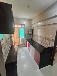 Kitchen Image of 853 Sq.ft 2 BHK Apartment / Flat for sale in Unique Tower, Badlapur East Badlapur for Rs. 4200000