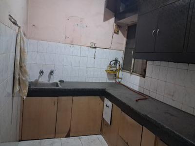 Kitchen Image of 1250 Sq.ft 3 BHK Apartment / Flat for sale in Vikaspuri New Delhi for Rs. 11800000