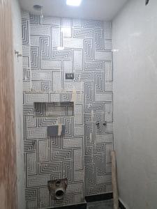 Common Bathroom Image of 1000 Sq.ft 3 BHK Builder Floor for sale in Sector 24 Rohini New Delhi for Rs. 11500000