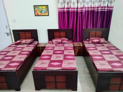 Bedroom Image of Chitra boys pg in Sector 41, Noida