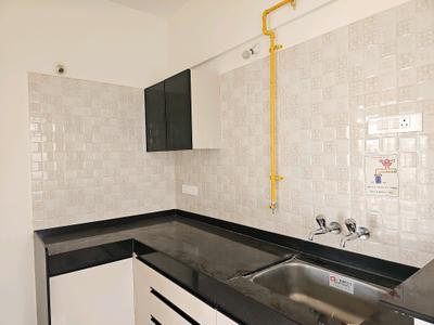 Kitchen Image of 806 Sq.ft 2 BHK Apartment / Flat for sale in Nyati Elan Central, Wagholi Pune for Rs. 6330000