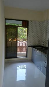 Kitchen Image of 880 Sq.ft 2 BHK Apartment / Flat for sale in Shree Viraj Sharmila Residency, Badlapur East Badlapur for Rs. 3700000