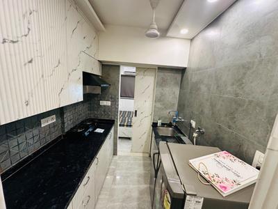 Kitchen Image of 400 Sq.ft 1 BHK Studio for rent in DLF Capital Greens Phase 1 And 2, Karampura New Delhi for Rs. 25000