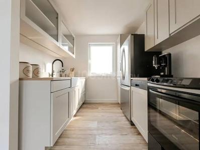 Kitchen Image of 1500 Sq.ft 3 BHK Apartment / Flat for sale in Mesacon Magic Carpet, Andheri West Mumbai for Rs. 54100000