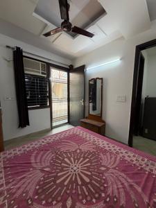 Bedroom Image of 900 Sq.ft 2 BHK Builder Floor for rent in Rajouri Garden New Delhi for Rs. 30000