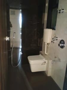 Common Bathroom Image of 600 Sq.ft 1 BHK Apartment / Flat for sale in Patel Nakshatra Residency, Ambernath West Ambernath for Rs. 2400000