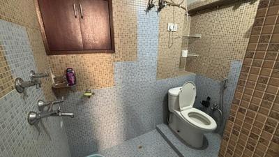 Bathroom Image of 600 Sq.ft 1.5 BHK Apartment / Flat for sale in Paradise Apartments, Sector 18 Rohini New Delhi for Rs. 5600000