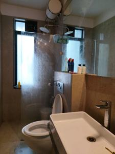 Common Bathroom Image of 1039 Sq.ft 2 BHK Apartment / Flat for sale in Sunteck City Avenue 1, Goregaon West Mumbai for Rs. 25000000