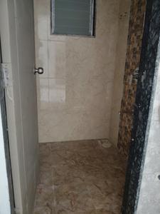 Common Bathroom Image of 645 Sq.ft 1 BHK Apartment / Flat for sale in Pushpak Nagar Navi Mumbai for Rs. 4550000