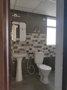 Common Bathroom Image of 1040 Sq.ft 2 BHK Apartment / Flat for sale in Rise Organic Homes Phase 1 by Rise Projects, Mahurali Ghaziabad for Rs. 7000000