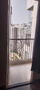 Balcony Image of 965 Sq.ft 1 RK Apartment / Flat for rent in Prateek Wisteria, Sector 77 Noida for Rs. 14500