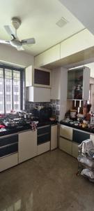 Kitchen Image of 1001 Sq.ft 2 BHK Apartment / Flat for rent in Ajmera Bhakti Park, Wadala East Mumbai for Rs. 90000