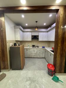 Kitchen Image of 990 Sq.ft 3 BHK Apartment / Flat for rent in Dream Home Luxury Floors, Dwarka Mor New Delhi for Rs. 27000