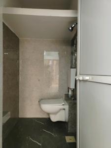 Common Bathroom Image of 500 Sq.ft 1 BHK Apartment / Flat for sale in Sunteck World, Naigaon East Naigaon for Rs. 3100000