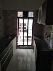 Kitchen Image of 1000 Sq.ft 2 BHK Apartment / Flat for sale in Suyog Nagar, Vasai West Vasai for Rs. 7000000