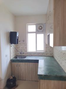 Kitchen Image of 603 Sq.ft 2 BHK Apartment / Flat for rent in Zara Rossa, Sector 112 Gurgaon for Rs. 17000