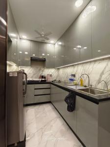 Kitchen Image of 1100 Sq.ft 1 BHK Builder Floor for rent in Sector 27 Gurgaon for Rs. 36000