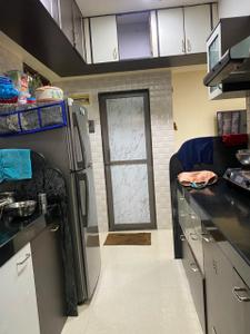 Kitchen Image of 672 Sq.ft 2 BHK Apartment / Flat for sale in Dharmesh Om Sai Tower, Dahisar West Mumbai for Rs. 13500000