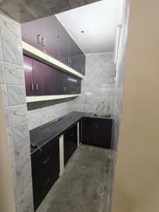 Kitchen Image of 850 Sq.ft 2 BHK Apartment / Flat for rent in Vikaspuri Luxury Homes, Vikaspuri New Delhi for Rs. 21000