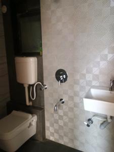 Common Bathroom Image of 650 Sq.ft 1 BHK Apartment / Flat for sale in Amrut Laxmi Raj Regalia Phase I, Ambernath East Ambernath for Rs. 2500000
