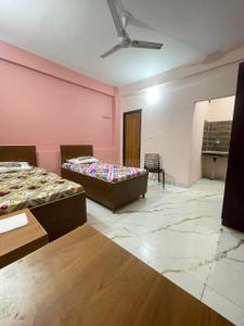 Bedroom Image of J.S LUXURY PG in Bajidpur, Noida