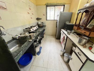 Kitchen Image of 520 Sq.ft 1 BHK Apartment / Flat for sale in Nirman Palace, Jogeshwari East Mumbai for Rs. 12600000