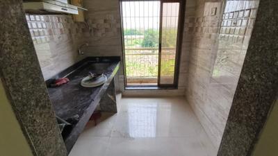 Kitchen Image of 700 Sq.ft 1 BHK Apartment / Flat for sale in Paradise Sai Harmony, Ulwe Navi Mumbai for Rs. 5200000