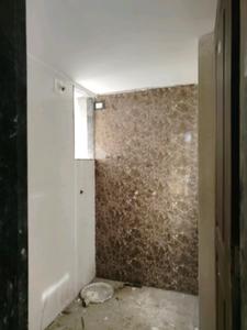 Common Bathroom Image of 700 Sq.ft 1 BHK Apartment / Flat for sale in Ashapura Galaxy, Ambivli Thane for Rs. 2725000