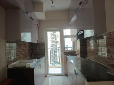 Kitchen Image of 1185 Sq.ft 3 BHK Apartment / Flat for sale in NBCC Tropical Garden, Noida Extension Greater Noida for Rs. 8621000