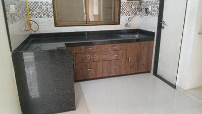 Kitchen Image of 1180 Sq.ft 2 BHK Apartment / Flat for rent in Universal Bilvam Paradise, Pal Gam Surat for Rs. 18500
