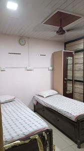 Bedroom Image of Pu pg in Borivali East, Mumbai