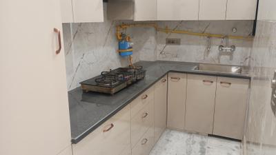 Kitchen Image of 1000 Sq.ft 2 BHK Independent House for rent in RWA Lajpat Nagar 4 Colonies, Lajpat Nagar New Delhi for Rs. 50000