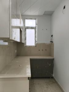Kitchen Image of 1500 Sq.ft 3 BHK Apartment / Flat for sale in Ambesten Twin Chalet, Noida Extension Greater Noida for Rs. 5600500
