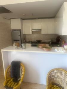 Kitchen Image of 1375 Sq.ft 2 BHK Apartment / Flat for rent in Supertech Supernova, Sector 94 Noida for Rs. 55000