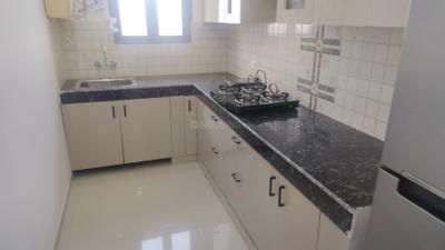 Kitchen Image of 900 Sq.ft 2 BHK Apartment / Flat for sale in Pareena Om Apartments, Sector 112 Gurgaon for Rs. 7200000