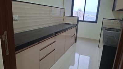 Kitchen Image of 900 Sq.ft 2 BHK Apartment / Flat for rent in Dynamix Divum, Malad East Mumbai for Rs. 75000